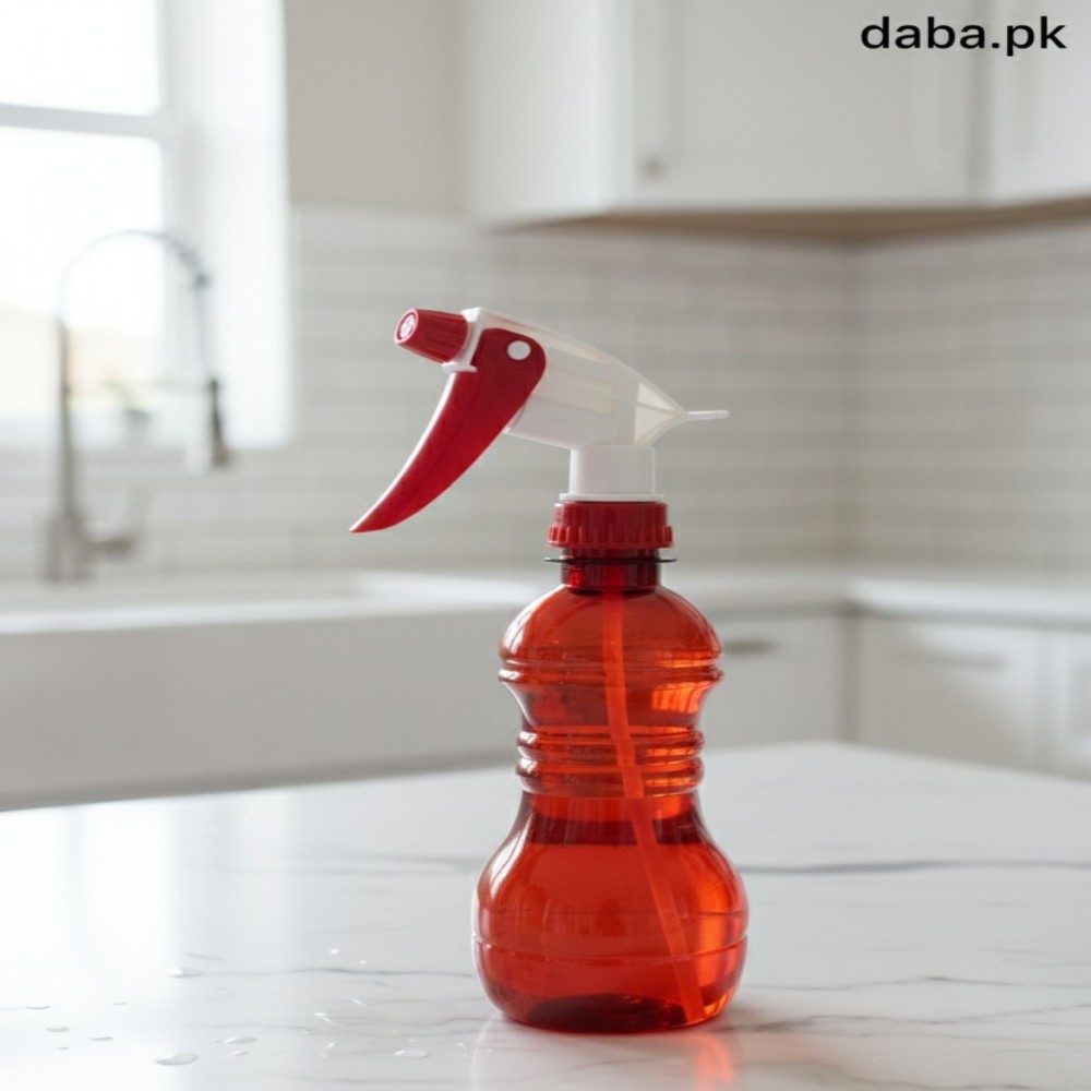Clear red plastic spray bottle with a unique contoured shape and durable white/red trigger for adjustable misting and spraying applications.